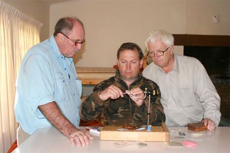  Jiri Klima ties a Czech Nymph on Ed Herbst's Jvice while on a recent trip to SA. Looking on are Giordano Zamps Zamparini and Karel Krivanec. Ed says that Jiri was suitably impressed. 